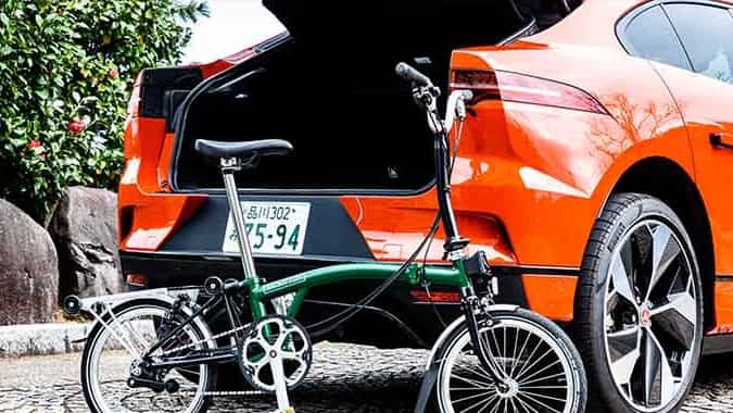 Orange Jaguar With Bike